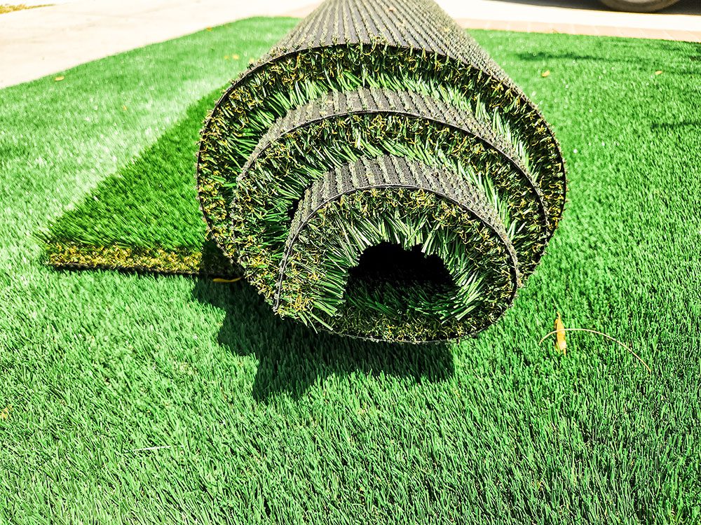 Rolled up artificial grass for pets