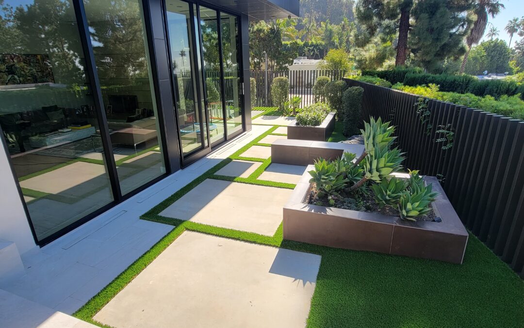 Why Artificial Grass and Concrete Go Hand in Hand in Modern Landscaping.